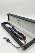 مسبحة بالزجاج البنفسجي